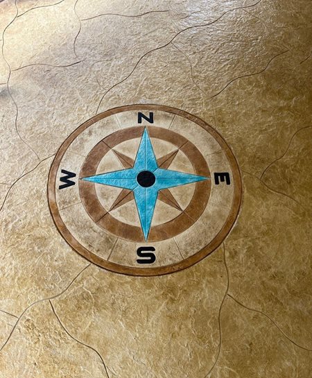 scored concrete compass rose